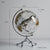 Globe Nordique Transparent sur Support Métallique : Élégance et Cartographie pour Votre Intérieur